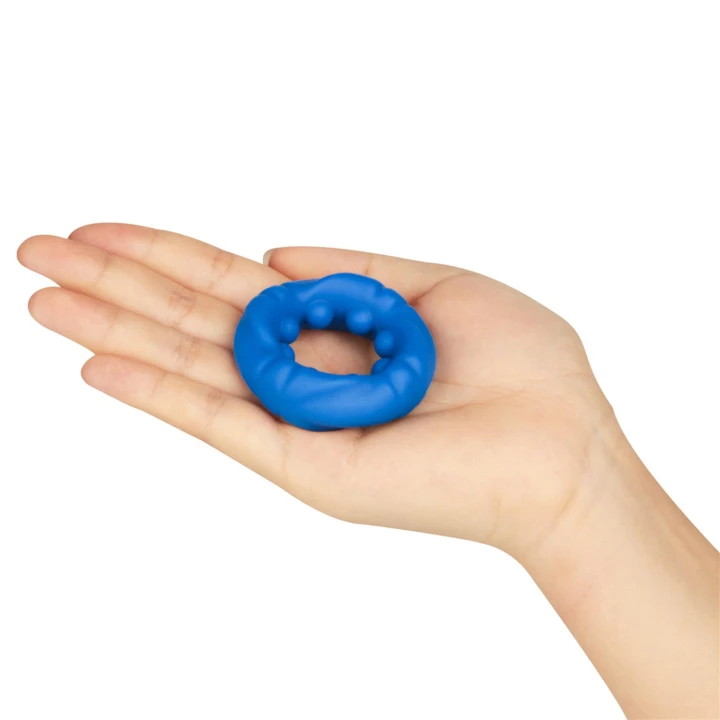 Rozciągacz silikonowy o unikalnej strukturze z wypustkami, 2,4 cm, niebieski