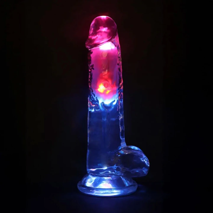 Dildo RealRock 20 cm - wibrujący, przezroczysty, z przyssawką i realistycznym kształtem
